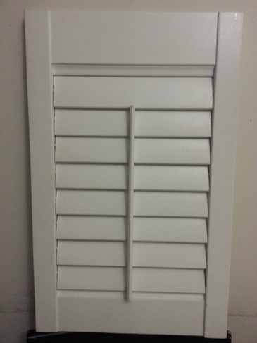 Two and Half inch Louvers Flat Style Closed Window Shutters at Modern Window Fashion - Window Treatments Caledon